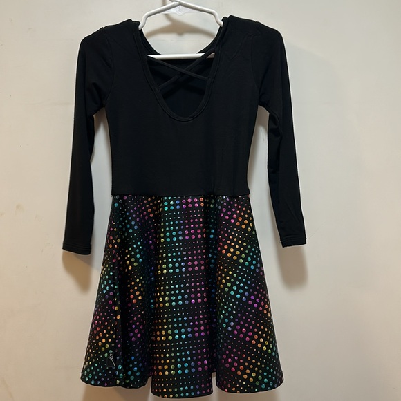 Pixie lane dress has black on top and flared rainbow sparkle on bottom. Size 2/3 - Picture 3 of 5
